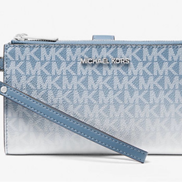 Michael Kors Handbags - Michael Kors Silver Wristlet with Logo